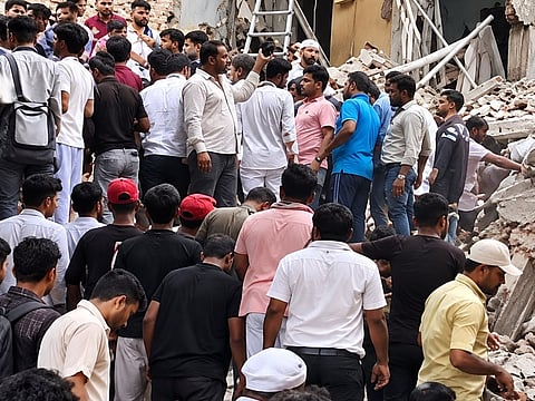 Rescuers race to find survivors after a five-story building collapses in northeast Delhi, killing three and injuring eight.