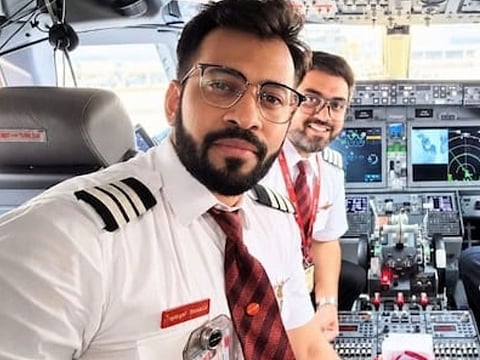 An undated photo shows Indian Capt. Smit Machchhar in the cockpit of a plane in an unknown location. Machchhar was at the controls of a flydubai flight FZ1073 that was diverted to Tabuk in northwestern Saudi Arabia for an emergency landing on Wednesday, Sept. 30, 2026.