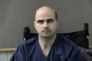 This April 9, 2010 file photo released by the Bell County Sheriffs Department, shows US Major Nidal Hasan after being moved from Brooke Army Medical Center in San Antonio to Bell County Jail in Belton, Texas. Hassan, the US Army psychiatrist, was convicted of killing 13 people and wounding 32 in the 2009 Fort Hood mass shooting.