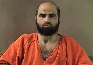 FILE - This undated photo provided by the Bell County Sheriff's Department shows former Army psychiatrist Maj. Nidal Hasan. (Bell County Sheriff's Department via AP, File)