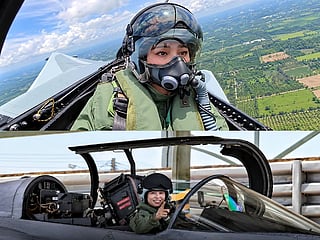 Thailand's Queen Suthida flies fighter jet solo