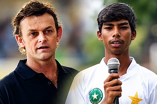 Australian cricket legend Adam Gilchrist (left) and his young Pakistani namesake, who scored 117 runs in a school cricket match in Karachi.