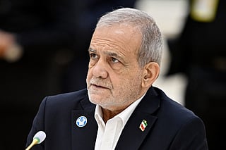 In this pool photograph distributed by the Russian state agency Sputnik, Iranian President Masoud Pezeshkian attends a meeting of the Commonwealth of Independent States (CIS) Heads of State Council in Turkmenbashi on October 9, 2026.