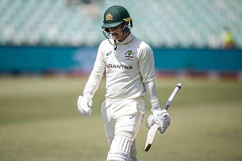 Australia's Nic Maddinson walks back to the pavilion after his dismissal on day one of the first Test match between South Africa and Australia at the Kingsmead stadium in Durban on October 9, 2026.