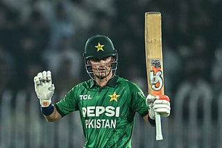 Pakistan's Maaz Sadaqat celebrates after scoring a half-century (50 runs) during the first T20 international cricket match between Pakistan and Sri Lanka at the Rawalpindi Cricket Stadium in Rawalpindi on October 9, 2026.