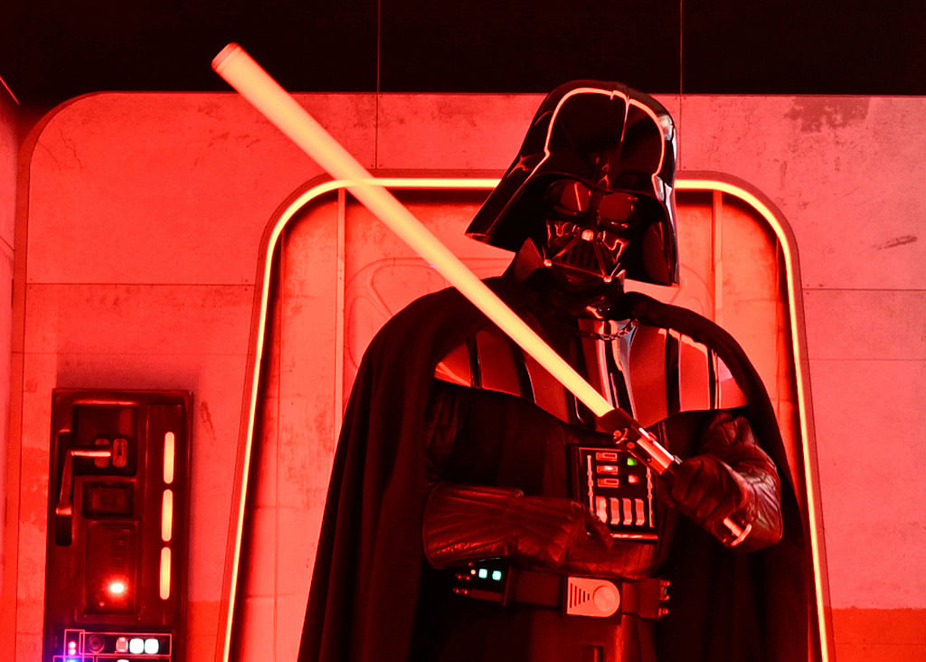 FILE - A Darth Vader costumed character poses at the Hasbro and Amazon Star Wars interactive Imperial March experience at the Empire State Building March 21, 2024, in New York. (Photo by Evan Agostini/Invision/AP, File)