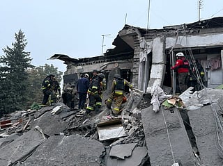 Rescuers conduct search and rescue operations following a Russian attack that struck a five-storey residential building and killed seven people, including three children, in Zaporizhzhia, Ukraine, on October 10, 2026.