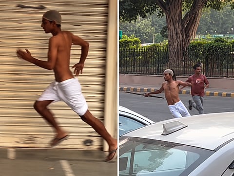 A Mahatma Gandhi lookalike runs along a street in Delhi in a viral video circulating on social media amid heightened security ahead of a protest at Jantar Mantar.