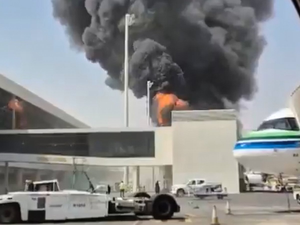This image from video obtained and verified by AP shows thick black smoke and flames rising from a fire at King Khalid International Airport in Riyadh, Saudi Arabia, on Friday, October 9, 2026. 