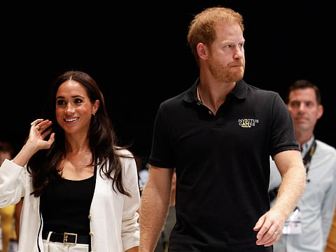 Prince Harry and his wife Meghan