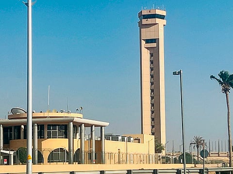 (FILES) An air traffic control tower is seen at King Khalid International Airport in Riyadh on September 19, 2026. A fresh Houthi strike hit Riyadh's international airport on October 11, a day after another attack claimed by the Yemeni group killed at least a dozen people and forced authorities to suspend operations at the facility. (Photo by AFP) /