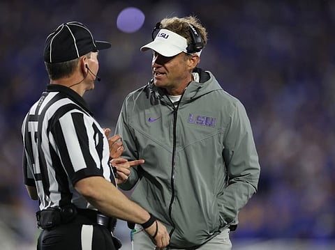 Lane Kiffin the head coach of the LSU Tigers talks with a game official during the game against the Kentucky Wildcats at Kroger Field on October 10, 2026 in Lexington, Kentucky.