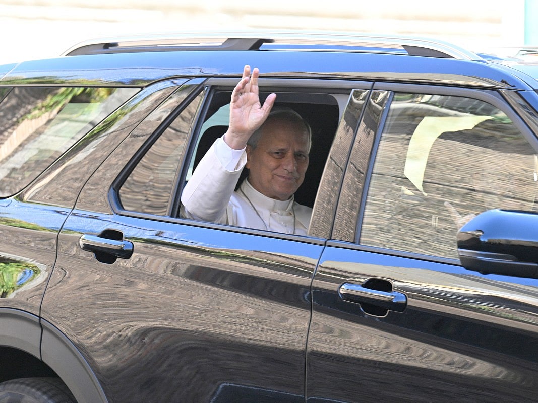 Pope Leo XIV leaves the Vatican before being admitted to Rome's Gemelli University Hospital for an operation to remove a lump from his lung, in the Vatican on 13 October 2026.