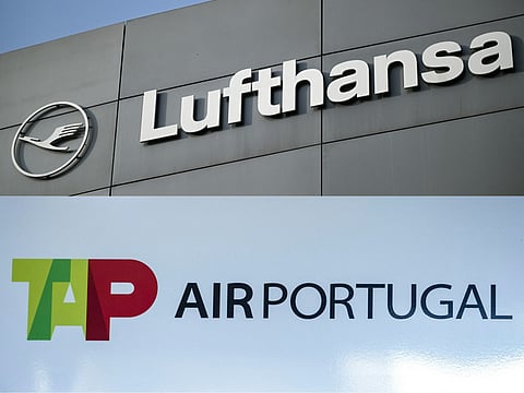 This combination of pictures created on October 14, 2026 shows the logo of German airline Lufthansa in Frankfurt am Main, western Germany, on March 6, 2026, and the logo of TAP Air Portugal airline at the Humberto Delgado Airport in Lisbon on April 2, 2026.