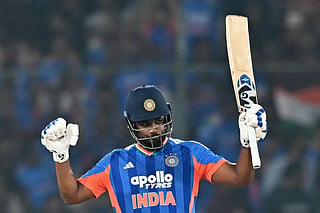 India's Sanju Samson celebrates after scoring a half-century (50 runs) during the fourth T20 international cricket match between India and West Indies at the Rajiv Gandhi International Stadium in Hyderabad on October 14, 2026.
