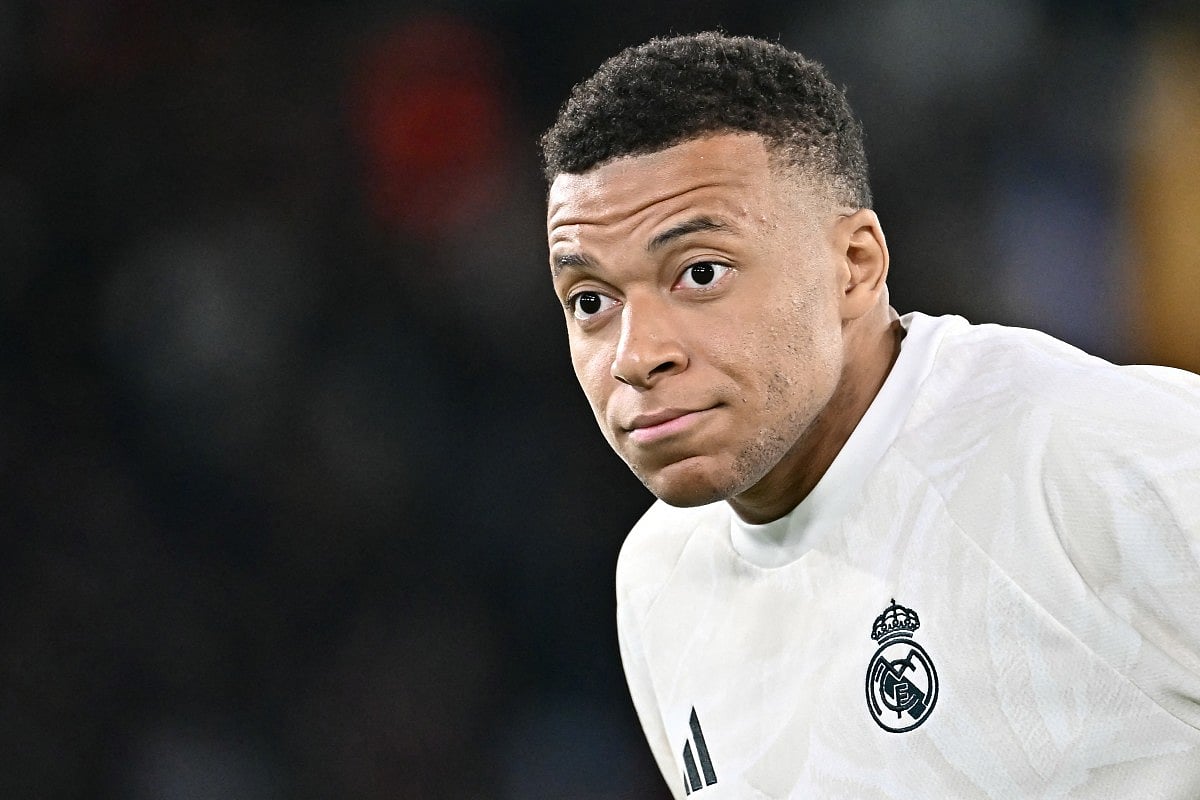 Real Madrid's French forward #10 Kylian Mbappe warms up before the UEFA Champions League - 1st round day 2 football match between AS Roma and Real Madrid at the Olympic Stadium in Rome on October 14, 2026.