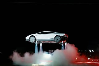 A grab taken on October 16, 2026 from a live feed released by Tesla shows the company unveiling on October 15 its next-generation Roadster electric car in McGregor, Texas, United States.