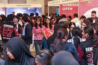 Young learners interacting with university representatives on the first day of Gulf News Edufair Abu Dhabi 