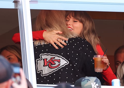 Donna Kelce hugs Taylor Swift during a game between the Los Angeles Chargers and the Kansas City Chiefs at Arrowhead Stadium on October 18, 2026 in Kansas City, Missouri.
