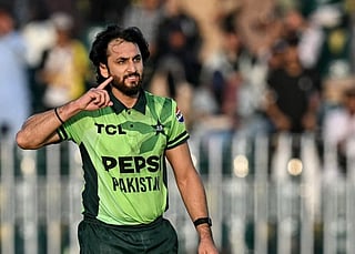 Pakistan's Salman Agha celebrates after scoring a century (100 runs) during the tri-series one-day international (ODI) cricket match between Pakistan and Sri Lanka at the Rawalpindi Cricket Stadium in Rawalpindi on October 18, 2026.