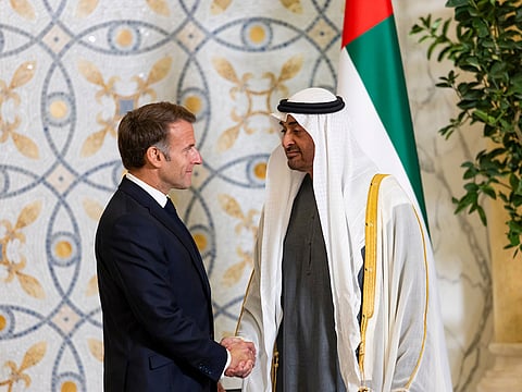Sheikh Mohamed receives Emmanuel Macron during an official visit reception.