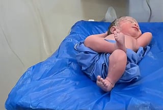 Newborn goes viral for cool pose