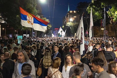Supporters of the Students List stage a protest in front of Serbia's Election Commission headquarters in Belgrade, Serbia, Wednesday, Oct. 7, 2026. (AP Photo/Marko Drobnjakovic)