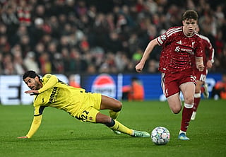Liverpool's English midfielder #53 James McConnell (R) outruns a challenge from Villarreal's Spanish striker #22 Ayoze Perez Gutierrez during the UEFA Champions League football match between Liverpool and Villareal at Anfield in Liverpool, north west England on October 20, 2026.
