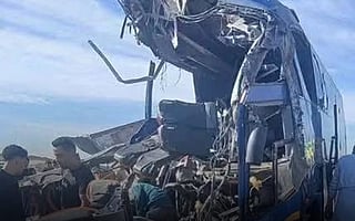 At least 13 people were killed and over 30 injured on Tuesday when a passenger bus collided with a heavy goods vehicle on Egypt's Cairo–Assiut Western Desert Road.