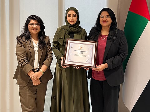 Badreya Al Maidoor (Center), Assistant Undersecretary of Support Services Sector at UAE Ministry of Economy, with Rajani Nalla (right), Founder-CEO of Trusity, and team.