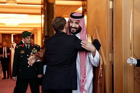 Saudi Crown Prince Mohammed Bin Salman accompanies French President Emmanuel Macron after a meeting at Al Yamamah Palace in Riyadh on October 21, 2026.