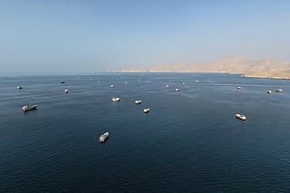 Ships recently anchored off Oman’s coast near the Strait of Hormuz.