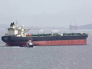 An example of a US-sanctioned crude oil tanker, the RAMONA I, due to its Iran links. Tracking databases list the same IMO number, 9233222, for both Triathlon and RAMONA I. It has the former names Shadi (until 2022), Seagull 21 (2021) and Triathlon (2021). The Triathlon record shows a crude oil tanker with the same IMO number, built in 2002 and sailing under the Liberian flag. The Ramona I record shows the same IMO, the same 84,586 gross tonnage and 164,445 deadweight tonnage, and a Panama flag.  Why '"Monrovia" appears: Monrovia is Liberia’s capital and the port of registry for Liberian-flagged ships. So “Triathlon, registered in Monrovia” means it was Liberian-flagged at that point. It later appears under the Panama flag, which is consistent with the Panama-flagged vessels Treasury described in this action.