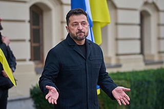 Ukraine's President Volodymyr Zelenskyy answers media questions before his meeting with Finnish Prime Minister Petteri Orpo in Kyiv, Ukraine, Thursday Oct. 22, 2026. (AP Photo/Efrem Lukatsky)