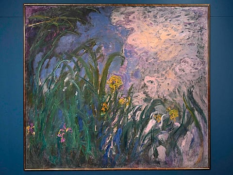 (FILES) This photograph shows French painter Claude Monet's "Iris", 1924–1925, during a preview of 28 Impressionist works of the Schlumberger Collection unveiled ahead of the October 22, 2026, sale at Sotheby's auction house in Paris on September 17, 2026. It is the most expensive work of art ever sold at auction in France: "Iris", a monumental painting by Claude Monet from the end of his life, was sold for 50 million euros (including fees) on October 22, 2026, in Paris. The Sotheby's auction room held its breath for nearly 45 minutes as bidders battled it out over the telephone. This painting by the master of Impressionism was on public display for the first time as part of the sale of the Schlumberger family’s collection. (Photo by LOU BENOIST / AFP) / RESTRICTED TO EDITORIAL USE - MANDATORY MENTION OF THE ARTIST UPON PUBLICATION - TO ILLUSTRATE THE EVENT AS SPECIFIED IN THE CAPTION