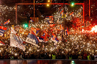 Supporters of Serbia's student-led movement attend the final campaign rally of the student-backed election list in central Belgrade on October 22, 2026, ahead of the country's snap parliamentary elections on October 25.