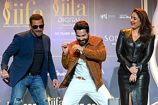 Bollywood actors Salman Khan (L), Varun Dhawan (C) and Kareena Kapoor attend the presser for the 27th edition of the International Indian Film Academy Awards (IIFA 2027) in Mumbai.