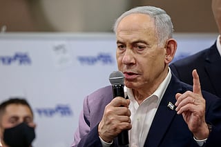 Israel's Prime Minister Benjamin Netanyahu speaks to his supporters during a Likud Party meet-and-greet held as part of the campaign ahead of Israel's legislative election, at King Solomon Hotel in Netanya on October 22, 2026.