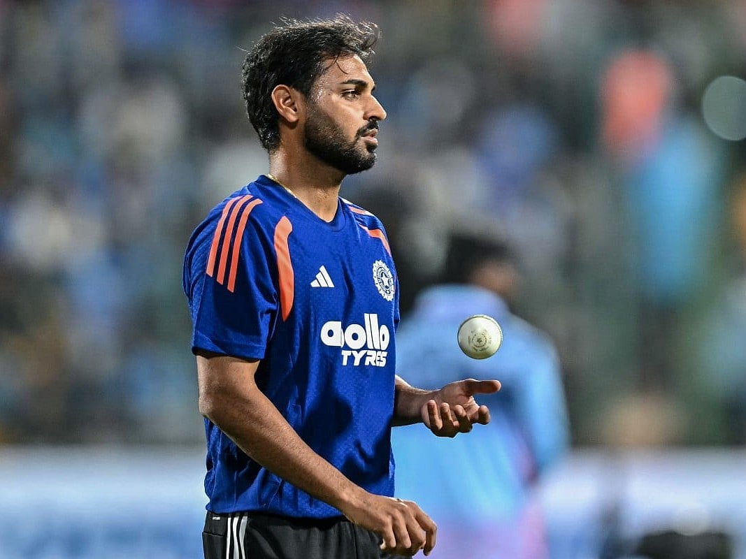 India's Bhuvneshwar Kumar warms up before the start of the fifth T20 international cricket match between India and West Indies at the M Chinnaswamy Stadium in Bengaluru on October 17, 2026.