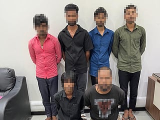 The suspects allegedly stole bank card details to make unauthorised purchases, transfer money into digital wallets and sell compromised card information to other fraudsters.