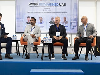 Kiran Chettigari, Director of HR, Zulekha Hospital; George Hojeige, Group CEO, Virtuzone; and Ameet Lakhiani, Group Managing Director, Alfred Holdings, speaking at a panel at Leadership Redefined. The event was moderated by Lakhlan Kitchen
