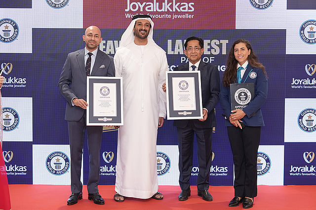 From left to right: John Paul Alukkas, CEO of Joyalukkas; Abdulla Bin Touq Al Marri UAE Minister of Economy and Tourism; Dr. Joy Alukkas, chairman of Joyalukkas Group; and Guinness World Records adjudicator