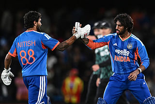 India's Tilak Varma (R) and Nitish Kumar Reddy celebrate after winning the second Twenty20 international cricket match between New Zealand and India at Hagley Oval in Christchurch on October 24, 2026.