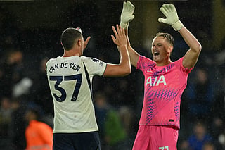 Tottenham Hotspur's Dutch defender #37 Micky van de Ven (L) and Tottenham Hotspur's Czech goalkeeper #31 Antonin Kinsky (R) celebrate on the pitch after the English Premier League football match between Chelsea and Tottenham Hotspur at Stamford Bridge in London on October 24, 2026.