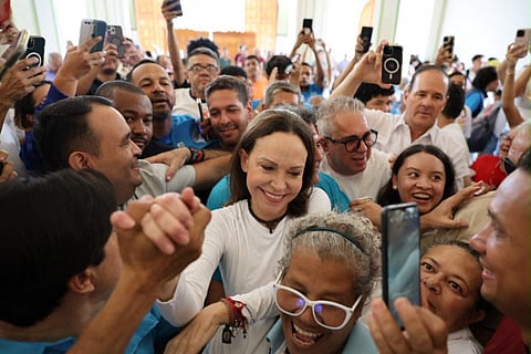 This handout photo released by the press office of the Vente Venezuela party, shows Venezuelan opposition leader Maria Corina Machado arriving at the Church of Santa Rosa in Barquisimeto, Venezuela on October 25, 2026.