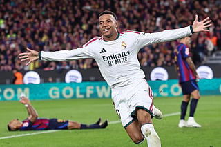 Kylian Mbappe struck twice to earn Jose Mourinho's Real Madrid a 2-1 Clasico victory over La Liga leaders Barcelona on Sunday at Camp Nou, cutting the gap to three points.