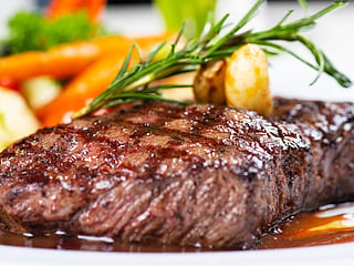 Look for intact packaging and properly chilled displays, but remember that fresh-looking meat is not necessarily safe.