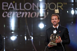 England and Bayern Munich forward Harry Kane reacts after receiving the Ballon d'Or award for the best male footballer during the 2026 Ballon d'Or France Football award ceremony at the Palladium Theatre in London on October 26, 2026.