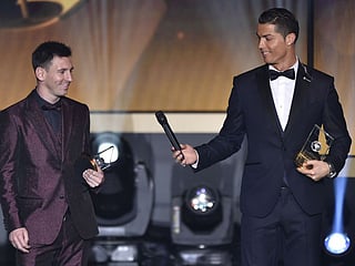 Ronaldo (right) and Messi, two of the game's tallest stars in the new millennium, are in a close race for the two of the most prestigeous Globe Soccer Awards this year.