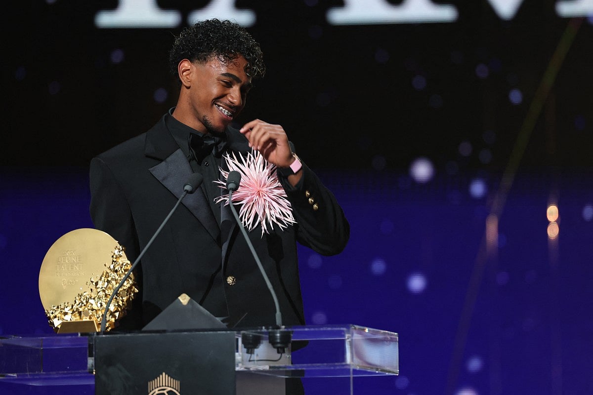 Spain and Barcelona forward Lamine Yamal speaks after winning the Trophy for the Men's Young Talent of the Year during the 2026 Ballon d'Or France Football award ceremony at the Palladium Theatre in London on October 26, 2026.